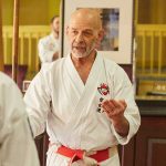 Hanshi Jeff Ader explains the art of Okinawan Karate to his students